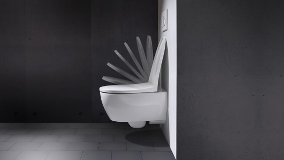 WC seat with soft-closing mechanism
