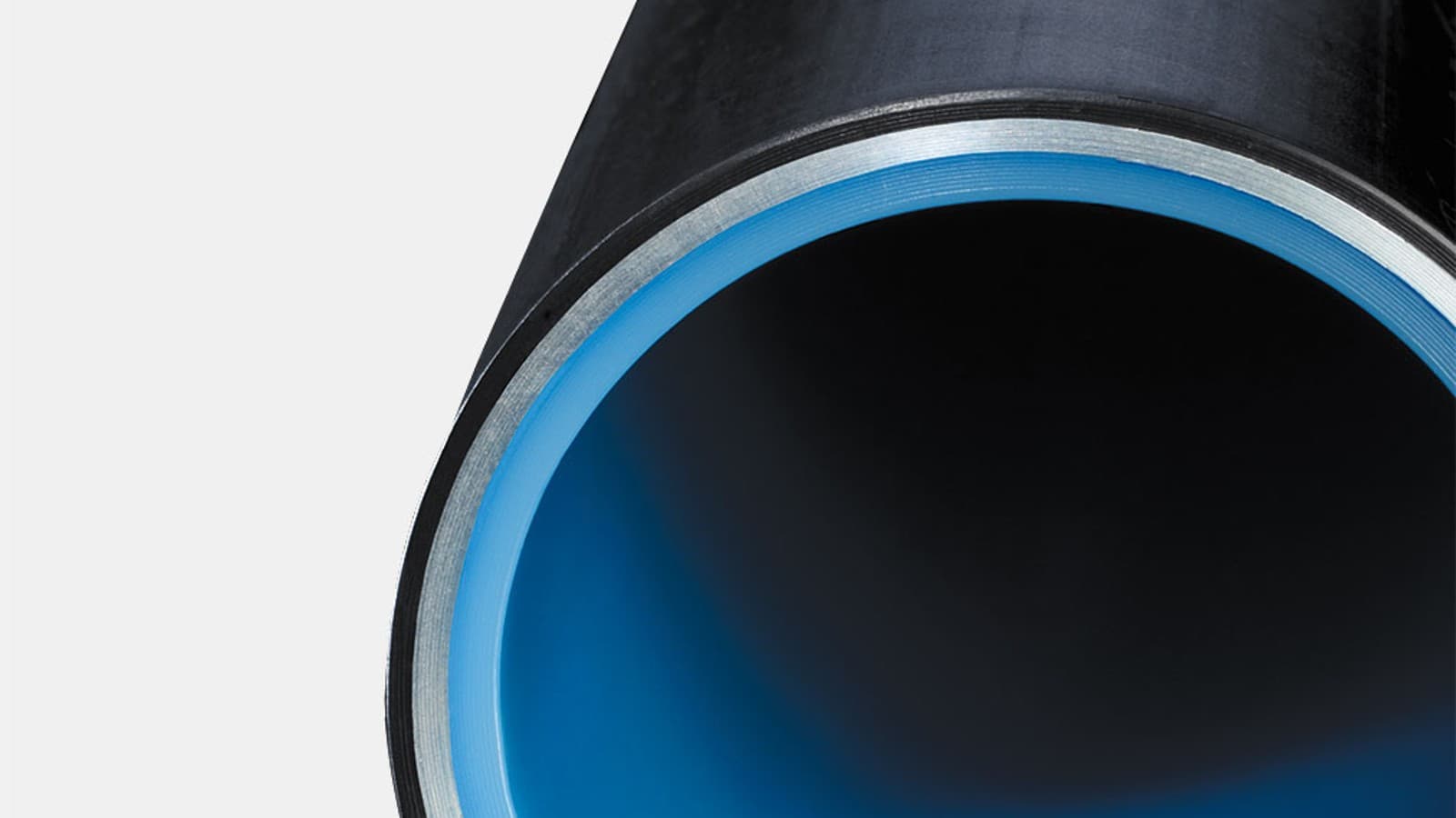 Cross-section of a three-layer Geberit Mepla multilayer pipe Cross-section of a three-layer Geberit Mepla multilayer pipe
